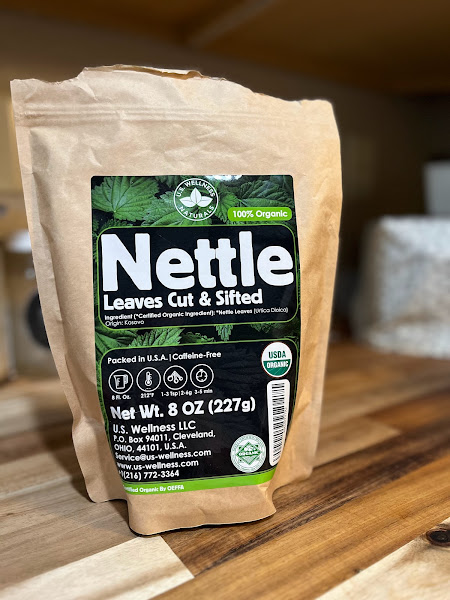 bag of stinging nettle leaves sitting on a counter